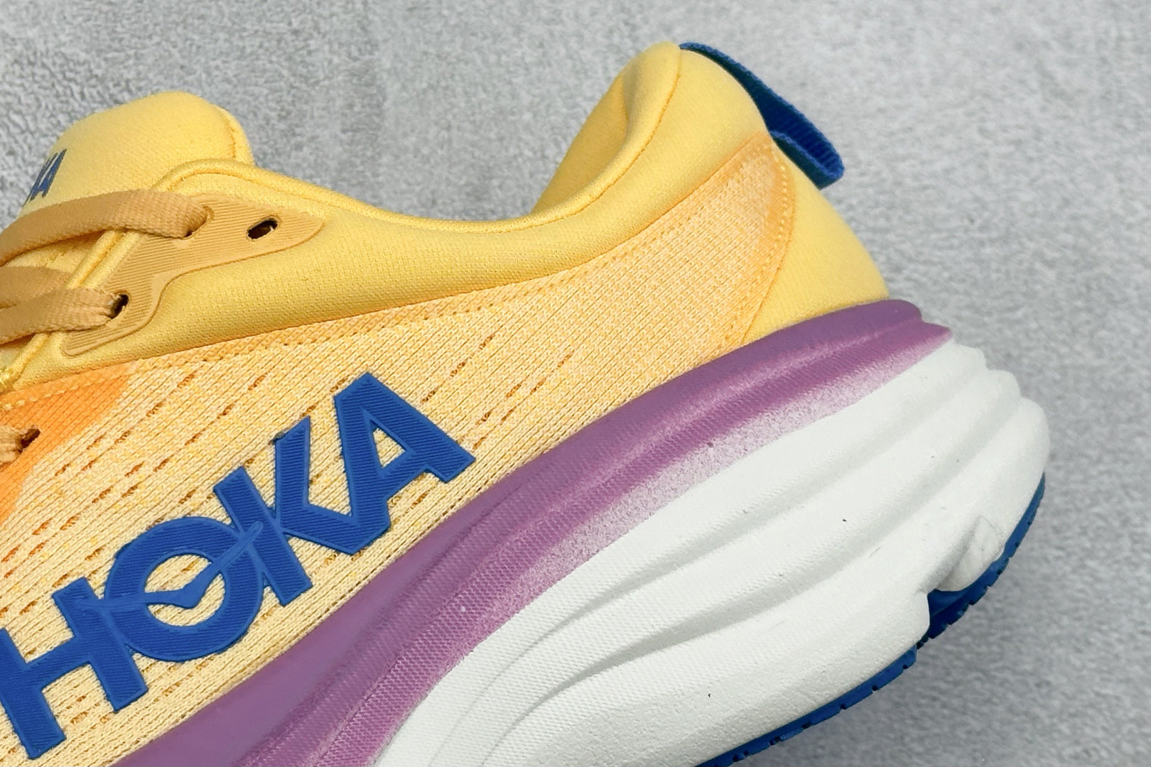 HOKA Bondi 8 Yellow Purple Gradient Blue Logo Running Shoes