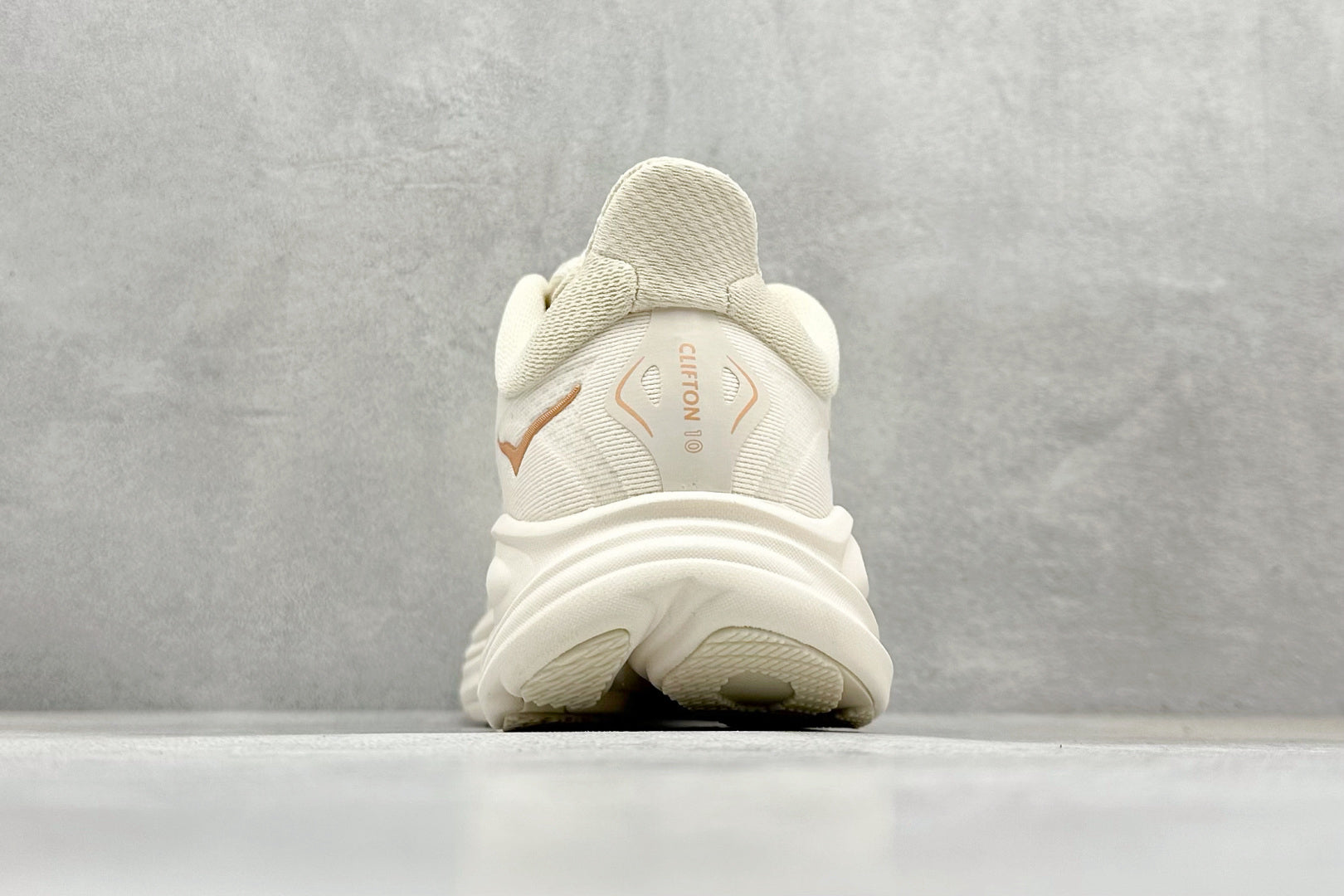 HOKA Clifton 10 Cream Peach Cushioned Road Running Sneakers