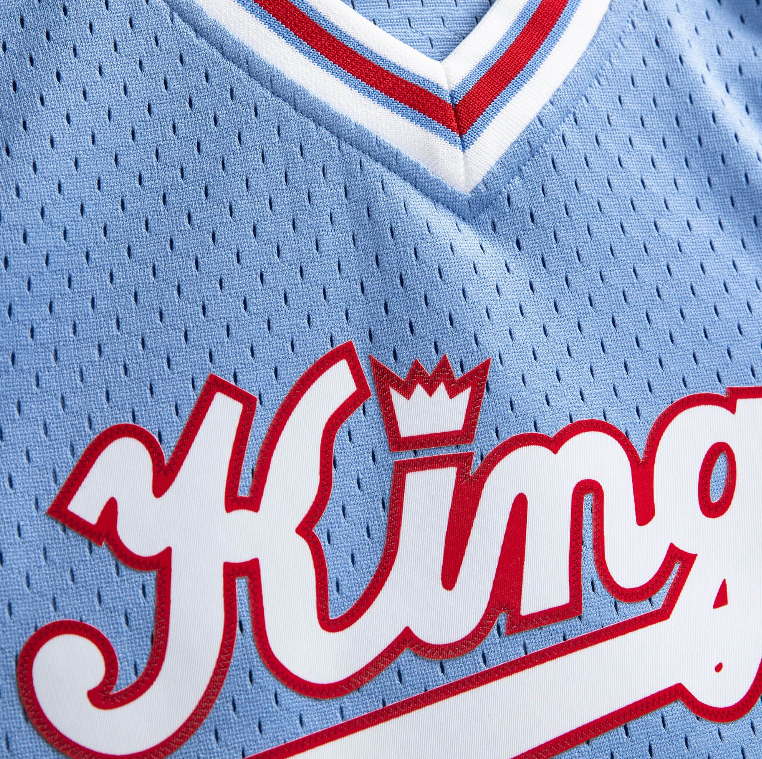 Men's Reggie Theus Sacramento Kings 1985-86 Powder Blue Swingman Replica Jersey By Mitchell & Ness