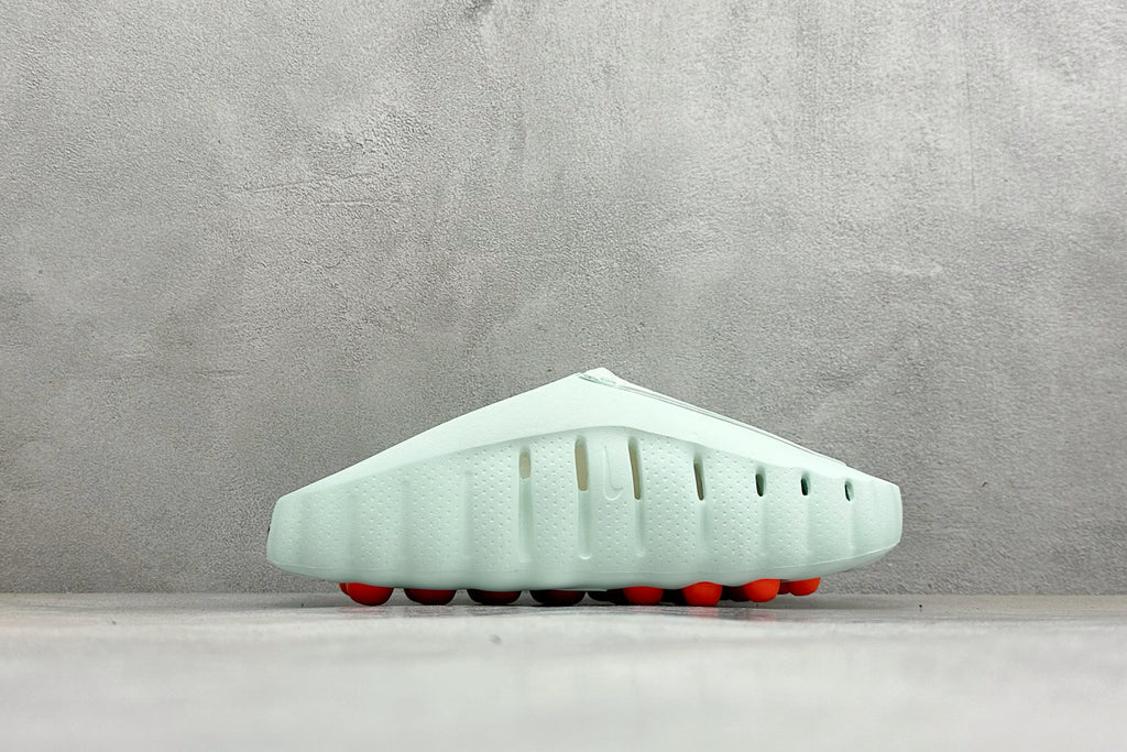 Nike Unisex "Neuro-Ball" Slide Sandal in Mint Green/Orange
